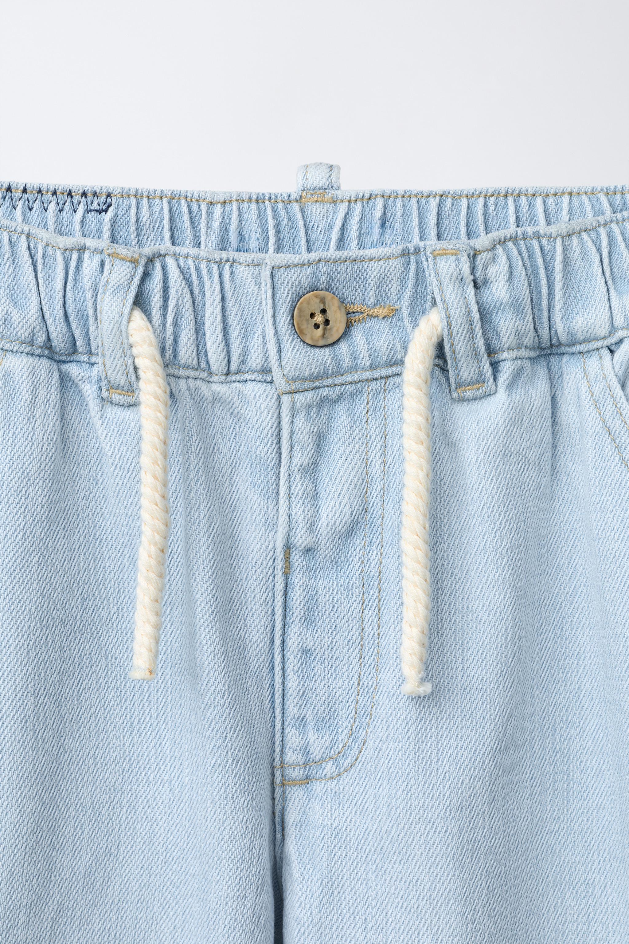 JEAN WIDE LEG À FORMES BRODÉES